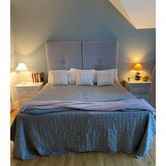 Either 3 single beds or 1 superking and 1 single with headboards