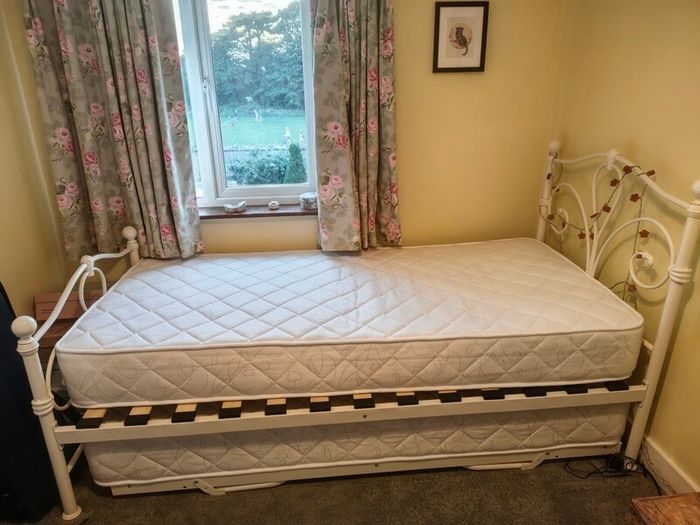 Single bed with pullout bed underneath