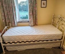 Single bed with pullout bed underneath