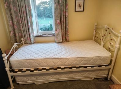 Single bed with pullout bed underneath