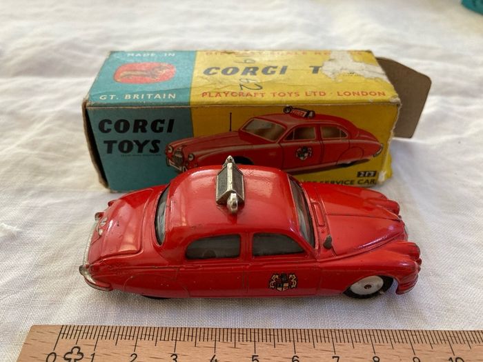 Corgi 213. Jaguar 2.4 Fire Service car. Boxed . Box and model in excellent condition (1959/61)