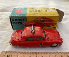 Corgi 213. Jaguar 2.4 Fire Service car. Boxed . Box and model in excellent condition (1959/61)