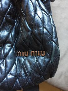 Miu Miu black leather bag
