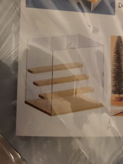 4 Tier clear acrylic display case for models, mini figures etc. Black base and steps + LED light