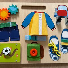 Activity board, zipping, tying laces