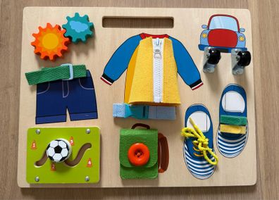 Activity board, zipping, tying laces