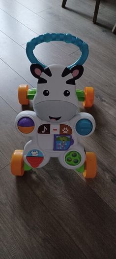 Fisher price zebra walker