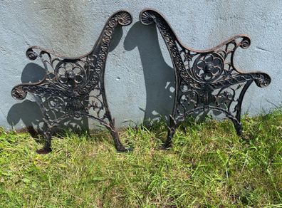 Pair of decorative cast  iron bench ends