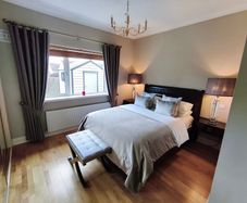 Dark wooden King Size Bed