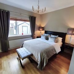 Dark wooden King Size Bed