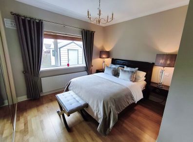 Dark wooden King Size Bed