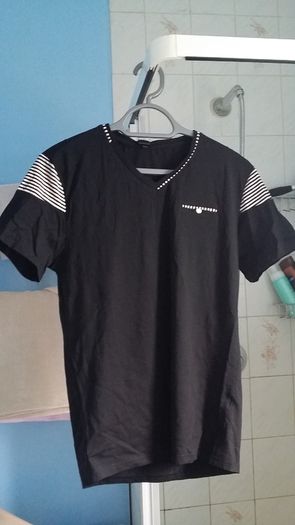 BNWT Casual black with some strips details top