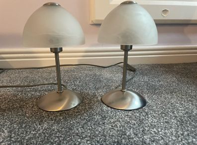 Pair of small glass bedside lamps