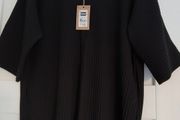 Black Dunnes zipped short sleeved top, size medium, new with tag