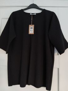 Black Dunnes zipped short sleeved top, size medium, new with tag