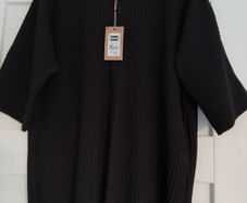 Black Dunnes zipped short sleeved top, size medium, new with tag