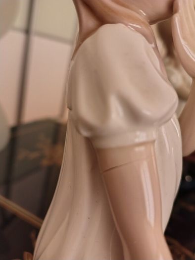 Nao by Lladro.  Yawning Girl. Damaged.