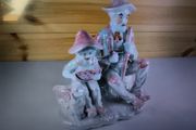 Vintage Porcelain Man with a Girl Eating WaterMelon God Log