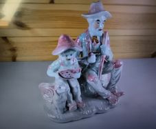 Vintage Porcelain Man with a Girl Eating WaterMelon God Log