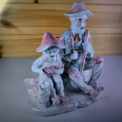 Vintage Porcelain Man with a Girl Eating WaterMelon God Log