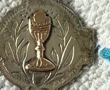 silver vintage communion medal