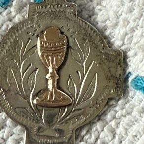 silver vintage communion medal