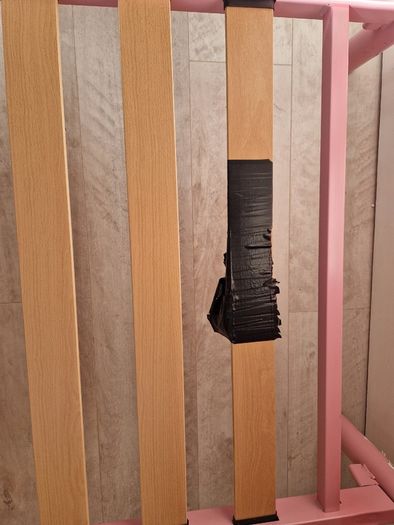 Pink metal frame toddler bed