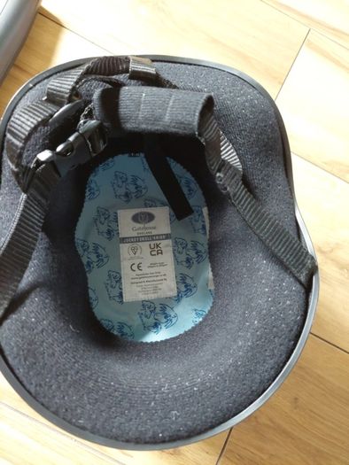 kids horse riding boots and helmet