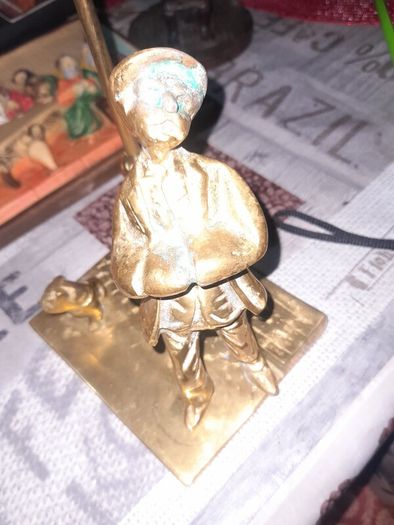 Very Old Solid Brass Man and Dog under a Street Lamp