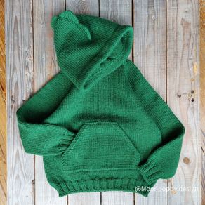 Green jumper in size 5-6 years