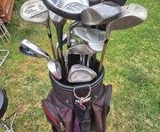 selection of golf clubs and bag.