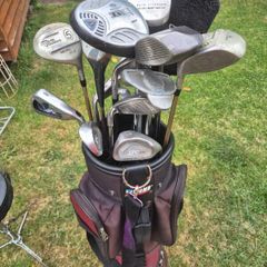 selection of golf clubs and bag.
