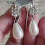 Elegant drop pearl earrings. Image 5