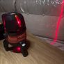 Hilti PM 4M Multi-Line Laser  Hilti PM 4M cordless multi-line laser with 360-degree rotation base, including the original red hardshell carry case. Image 3