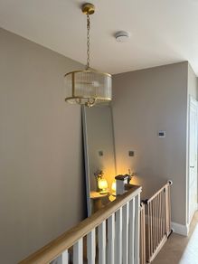 Brass and ribbed glass pendant light fitting