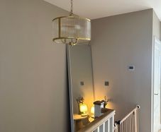 Brass and ribbed glass pendant light fitting