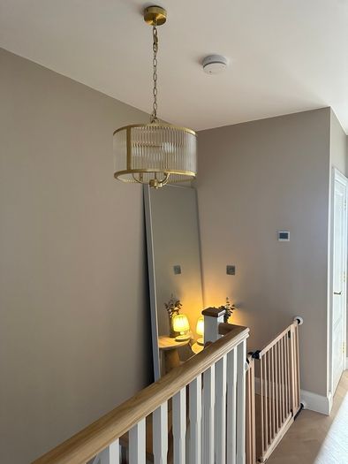 Brass and ribbed glass pendant light fitting