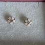 Pandora cherry blossom clips charm, featuring smooth cream enamel petals and a sterling silver beaded center very good condition Image 5