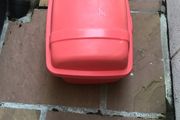 Large plastic storage boxes with covers.
