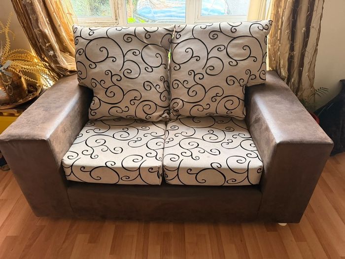 Brown leather-look sofa and armchair set