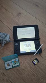 Nintendo 3DS XL silver / 2 games