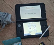 Nintendo 3DS XL silver / 2 games