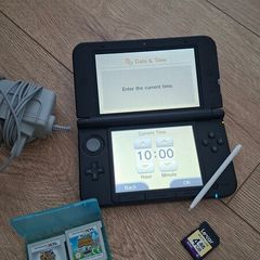 Nintendo 3DS XL silver / 2 games