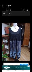 Ladies dress black lined lace top and decorated bottom half, new never worn.
