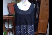 Ladies dress black lined lace top and decorated bottom half, new never worn.