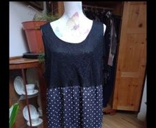 Ladies dress black lined lace top and decorated bottom half, new never worn.