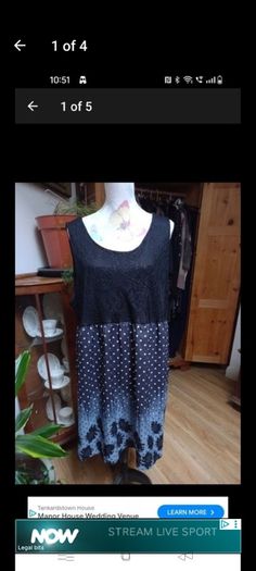 Ladies dress black lined lace top and decorated bottom half, new never worn.
