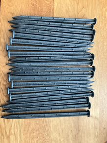 Brand new garden stakes / pegs