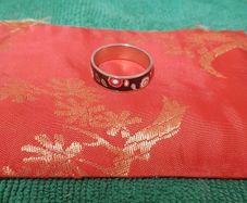 Ring with floral accents.