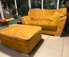 Mustard yellow velvet sofa with matching footstool